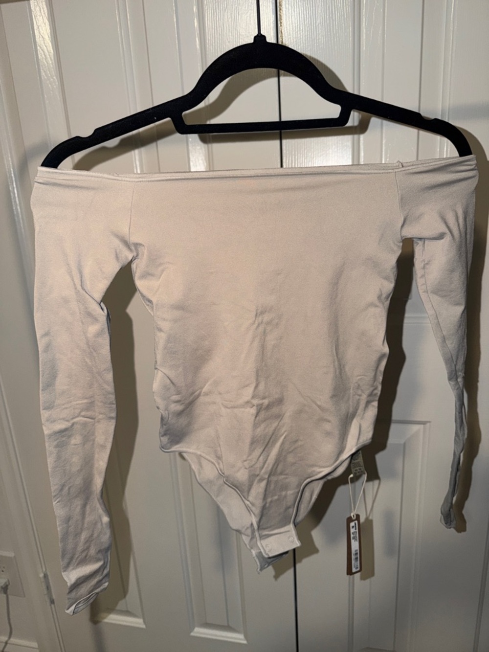SKIMS  Long Sleeve Bodysuit in Cream